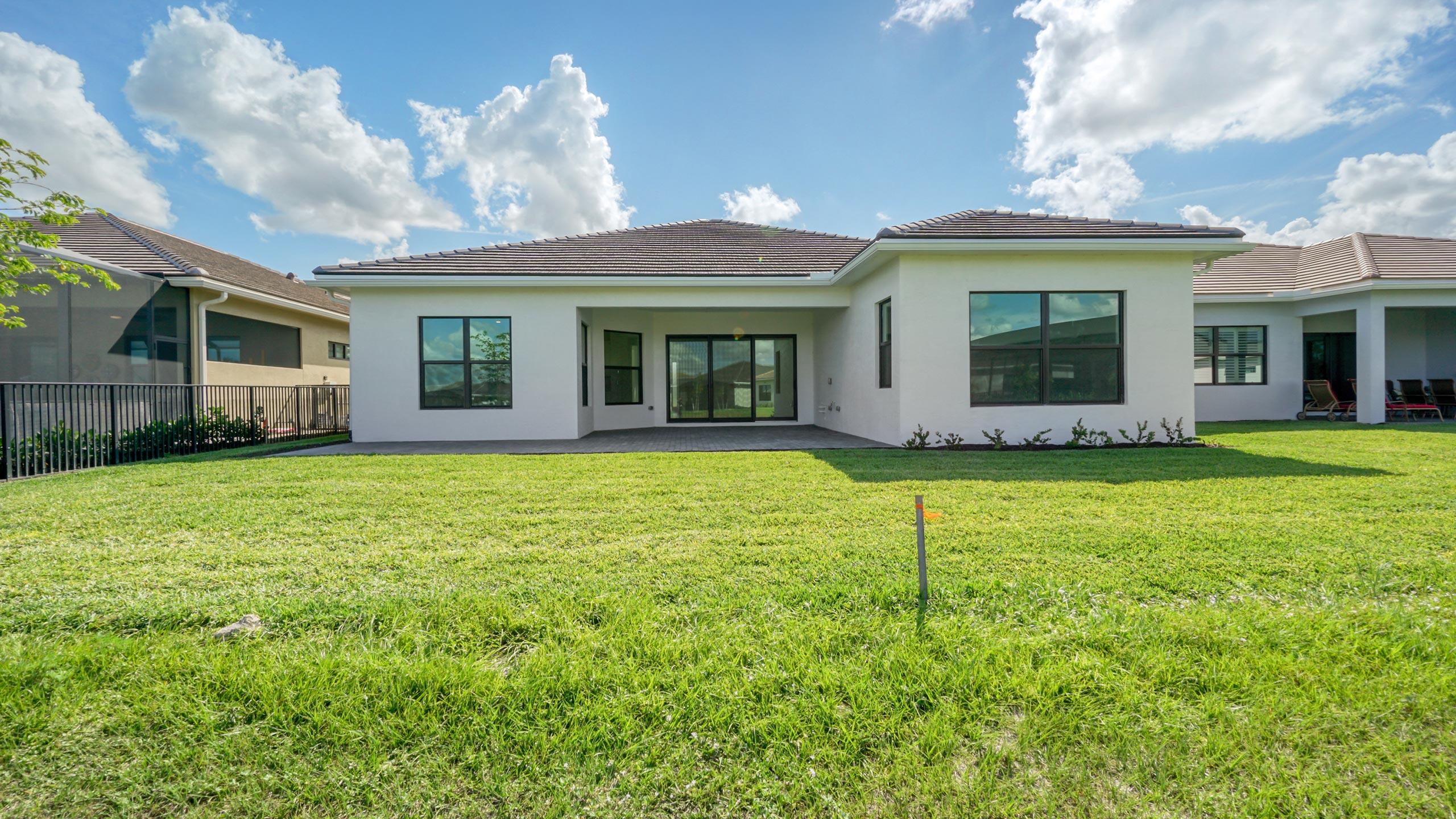 15739 Cresswind Place Westlake, FL 33470 - Photo 43 of 48 a view of a house with a garden