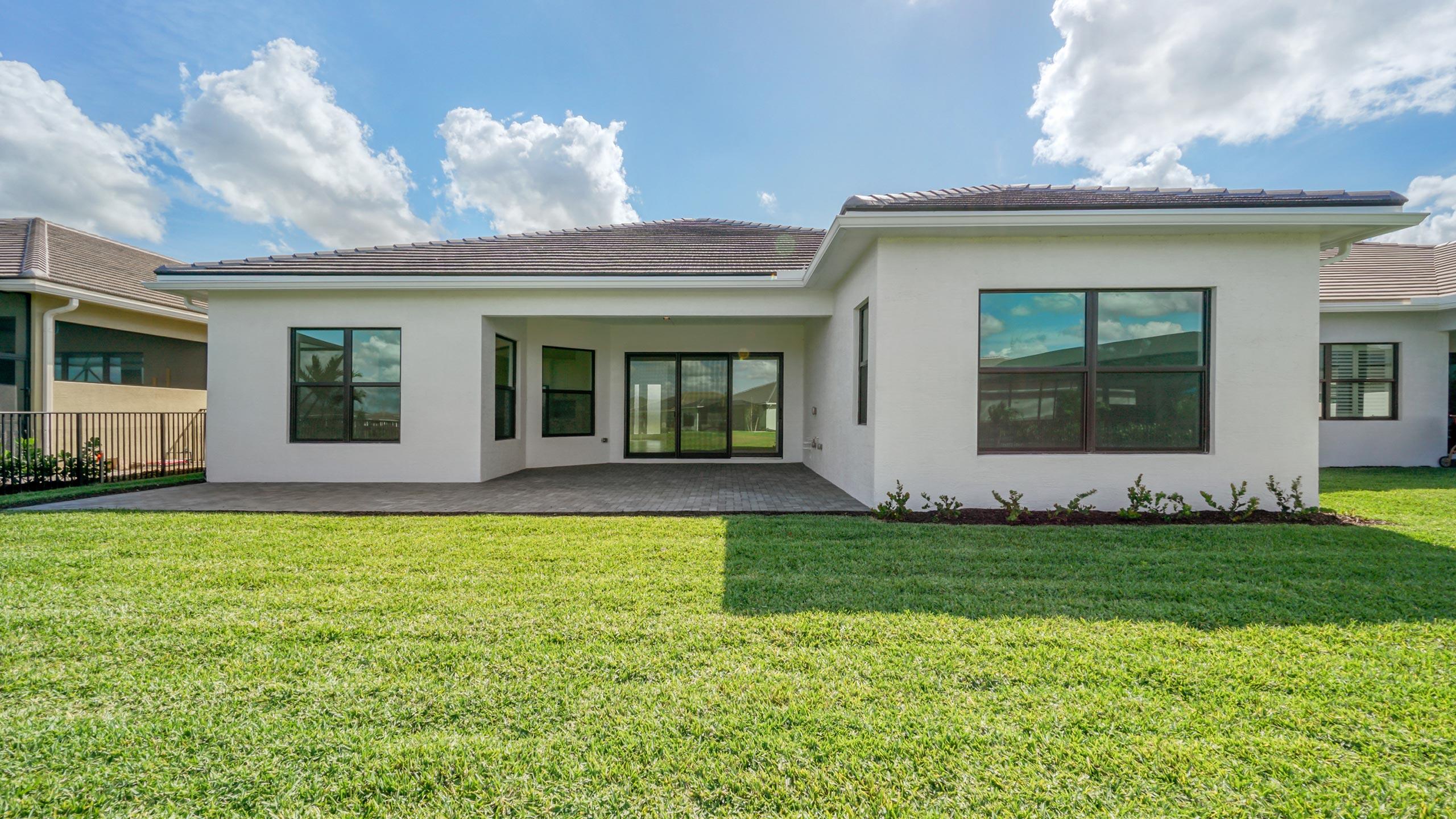 15739 Cresswind Place Westlake, FL 33470 - Photo 47 of 48 a view of a house with a yard