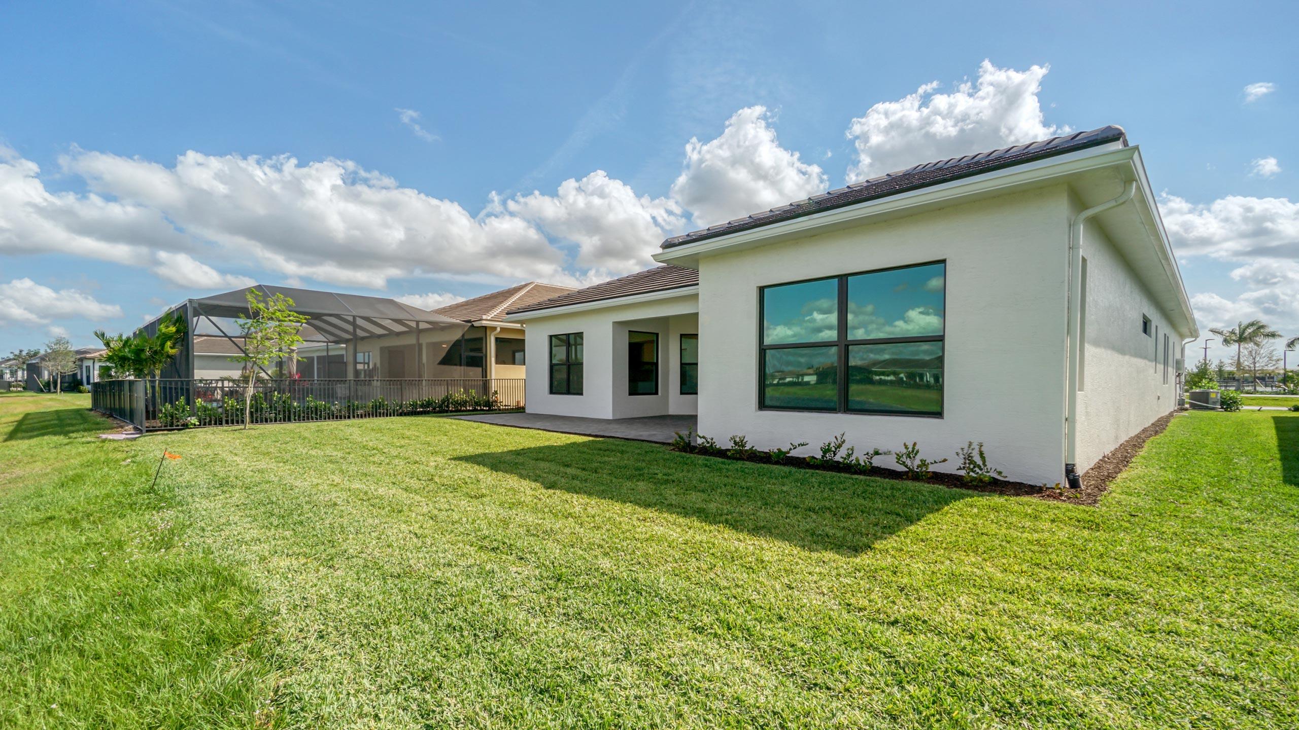 15739 Cresswind Place Westlake, FL 33470 - Photo 48 of 48 a view of a house with a back yard
