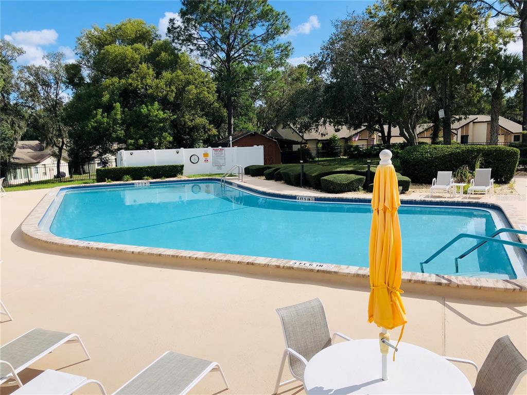 7280 Scotland Circle Weeki Wachee, FL 34613 - Photo 37 of 42 a view of a swimming pool with a patio