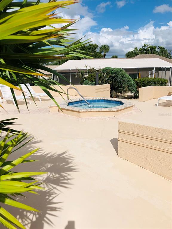 7280 Scotland Circle Weeki Wachee, FL 34613 - Photo 38 of 42 a view of swimming pool with an outdoor seating