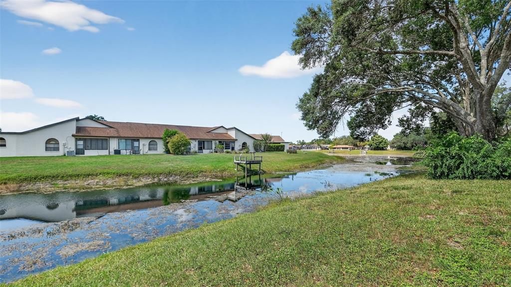 7280 Scotland Circle Weeki Wachee, FL 34613 - Photo 9 of 42 a view of house with garden