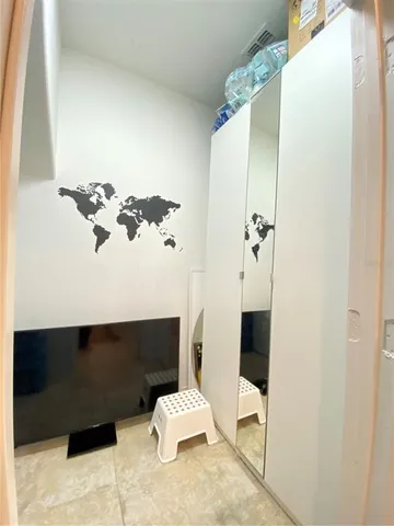 a view of a livingroom with furniture window and outside view