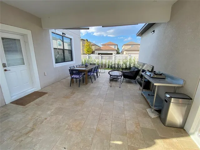 a bed room with a bed and a television