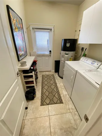a kitchen with stainless steel appliances granite countertop a stove top oven a sink and dishwasher