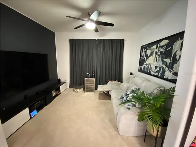 a view of a room with a potted plant