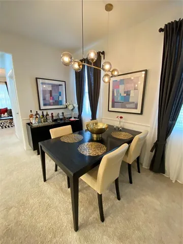 a living room with patio furniture