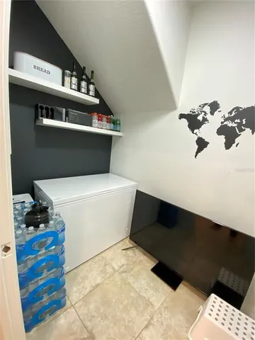 a bathroom with a bathtub and toilet