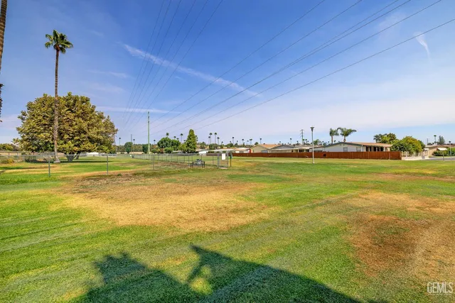 a view of a swimming pool with an ocean view