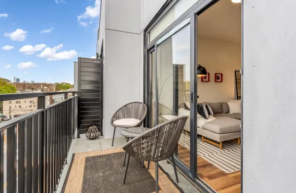 a view of balcony patio and outdoor seating