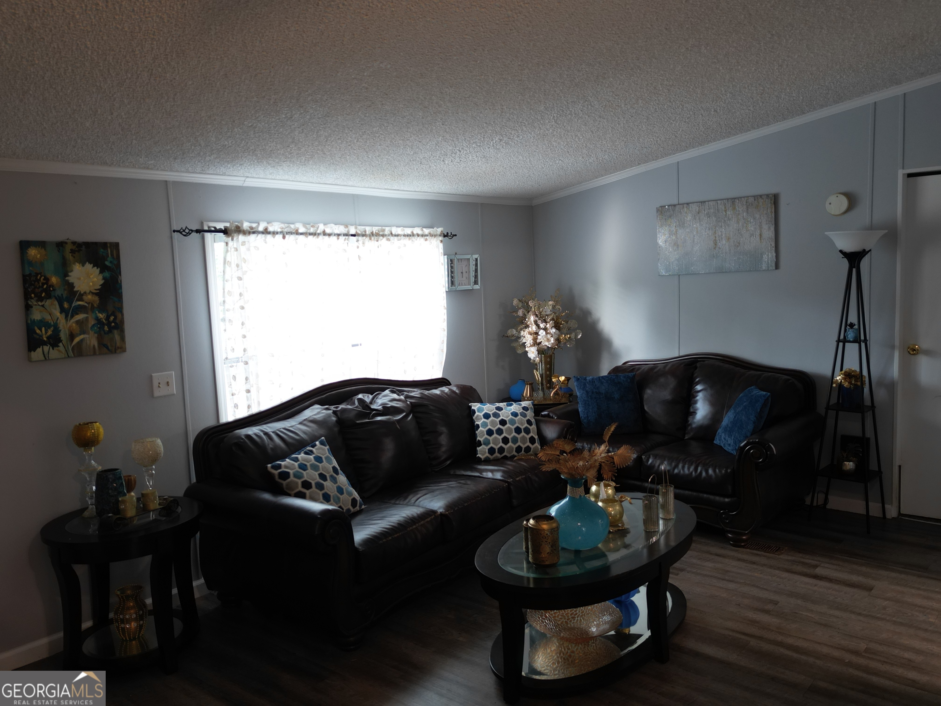 693 Old Quitman Annex Road Adel, GA 31620 - Photo 12 of 30 a living room with furniture and a mirror