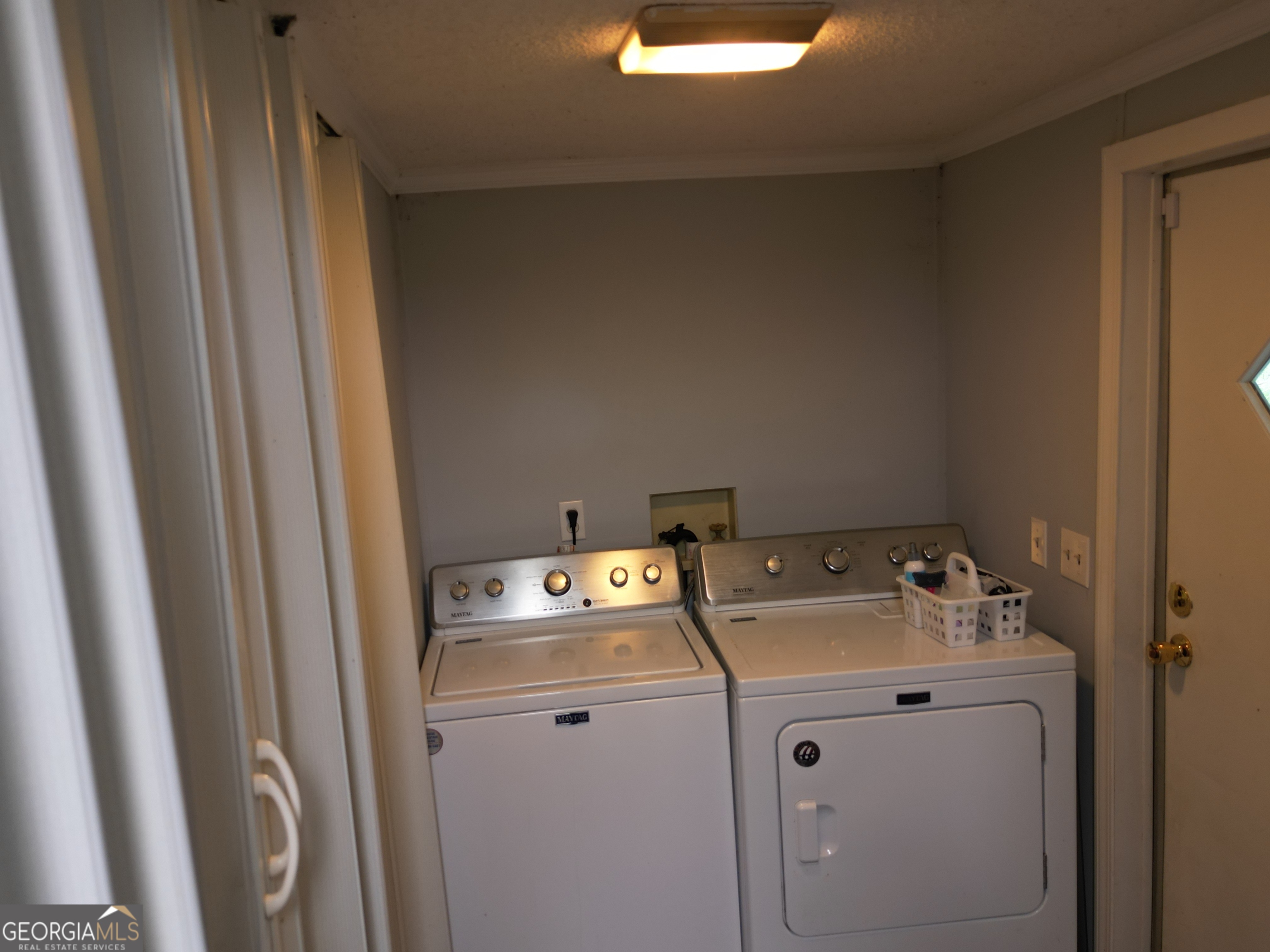 693 Old Quitman Annex Road Adel, GA 31620 - Photo 16 of 30 a utility room with dryer and washer