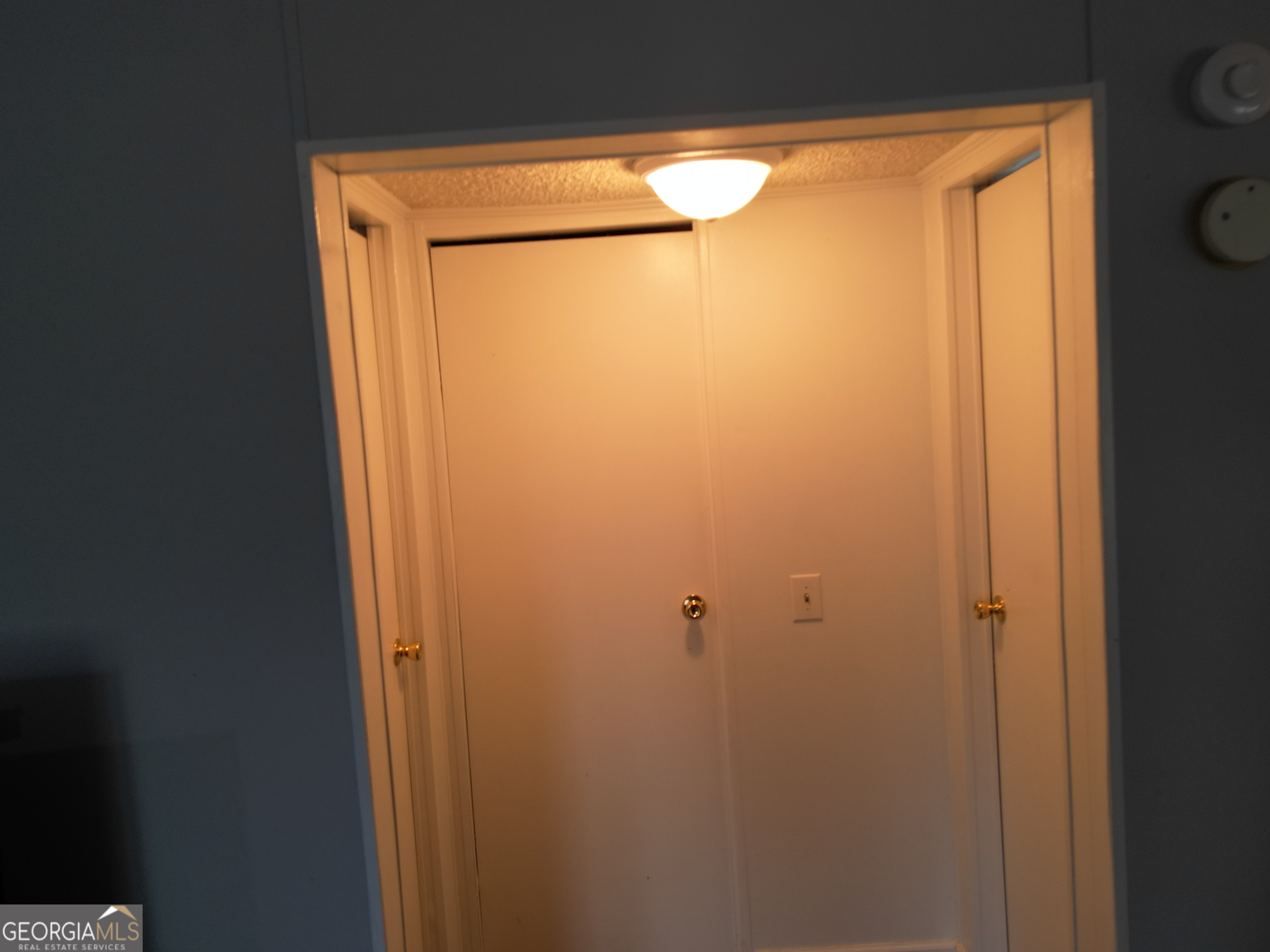 693 Old Quitman Annex Road Adel, GA 31620 - Photo 20 of 30 a bathroom with a glass shower door