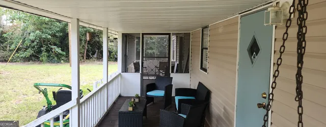 a view of a balcony with chair