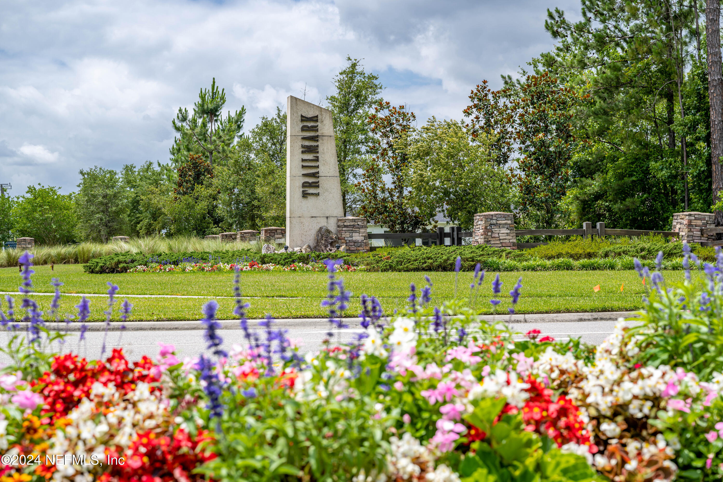 191 Bluegrass Way St. Augustine, FL 32092 - Photo 52 of 62 a view of a swimming pool with a yard