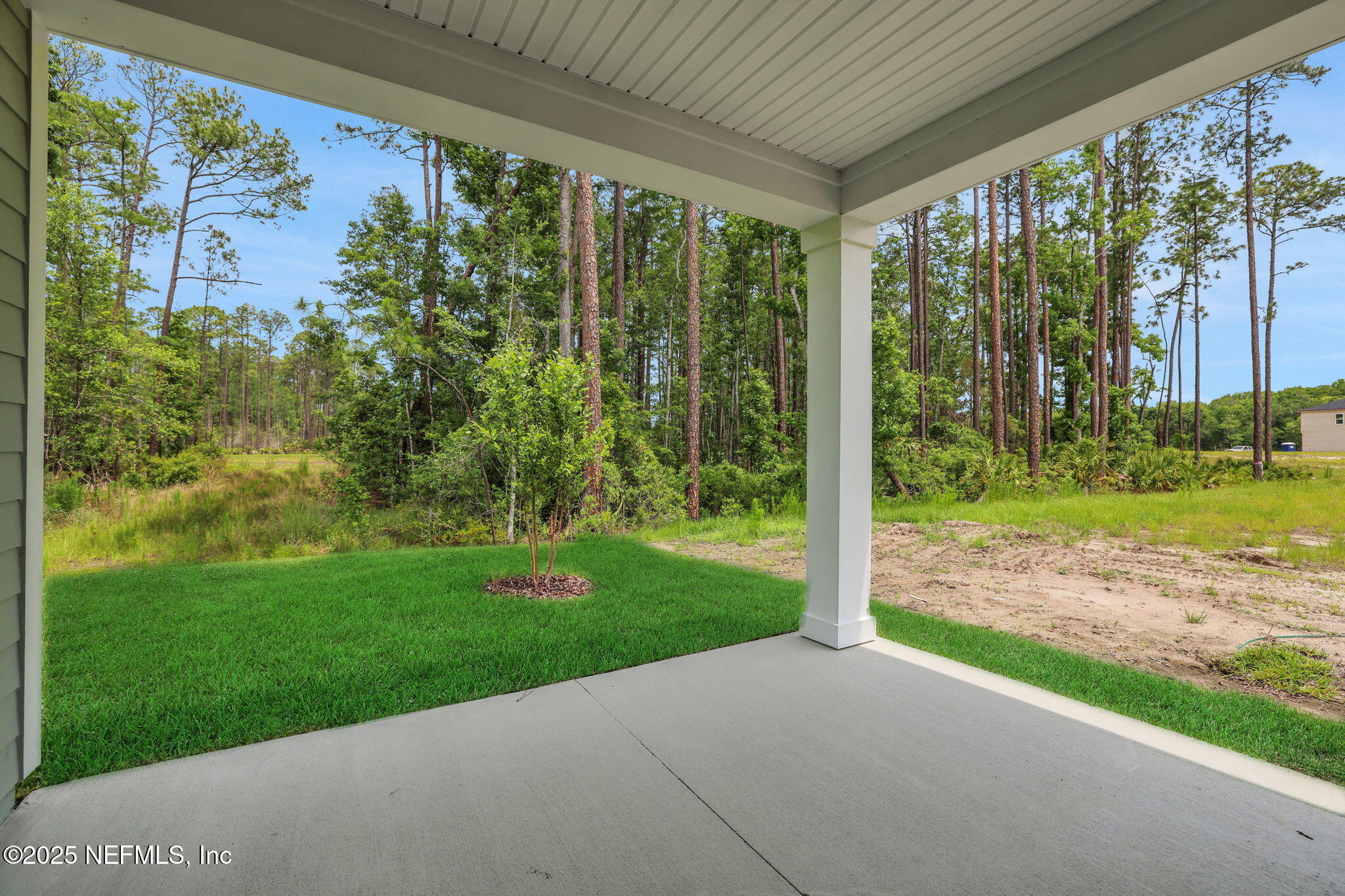 191 Bluegrass Way St. Augustine, FL 32092 - Photo 6 of 62 a view of a porch with a yard