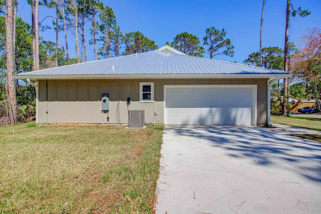 a view of a kitchen with wooden floor and a ceiling fan