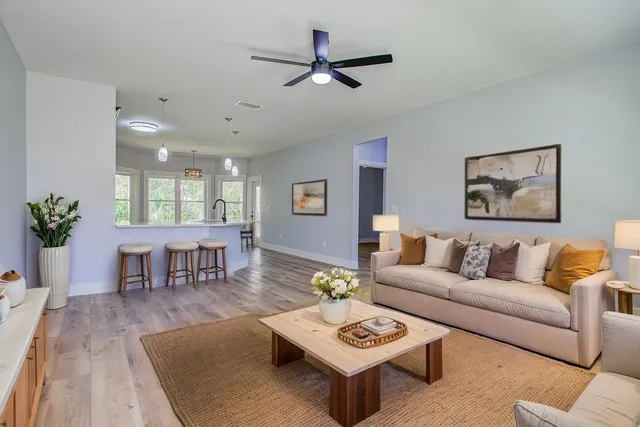 a kitchen with stainless steel appliances granite countertop a stove and a refrigerator