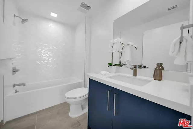 a view of a building with a street