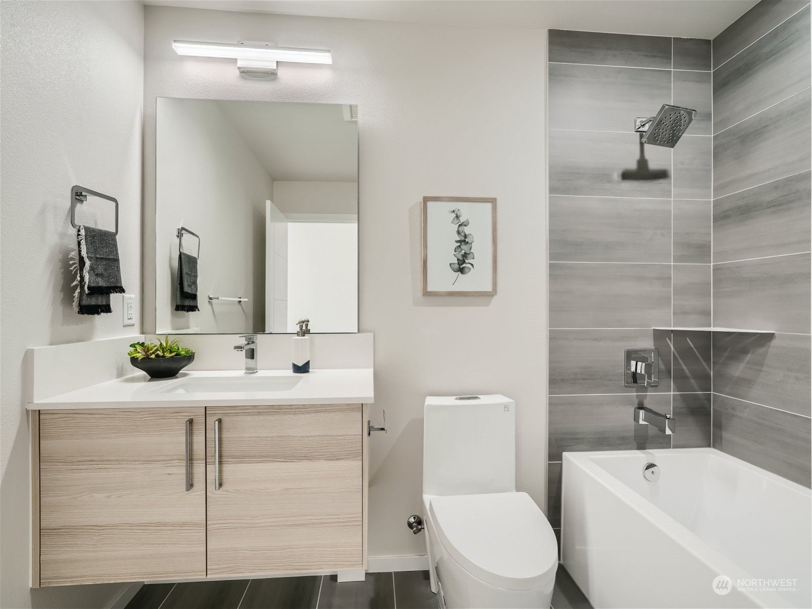 1916 South Grand Street Seattle, WA 98144 - Photo 14 of 26 a bathroom with a bathtub sink vanity mirror and toilet