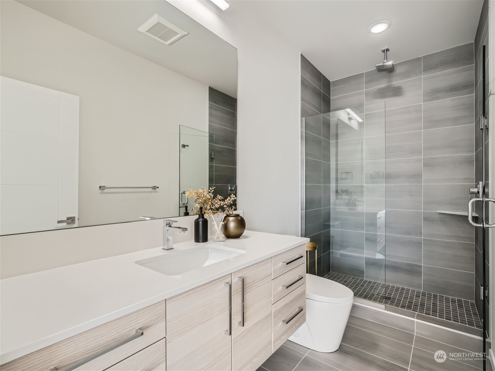 1916 South Grand Street Seattle, WA 98144 - Photo 17 of 26 a bathroom with a sink a toilet and shower