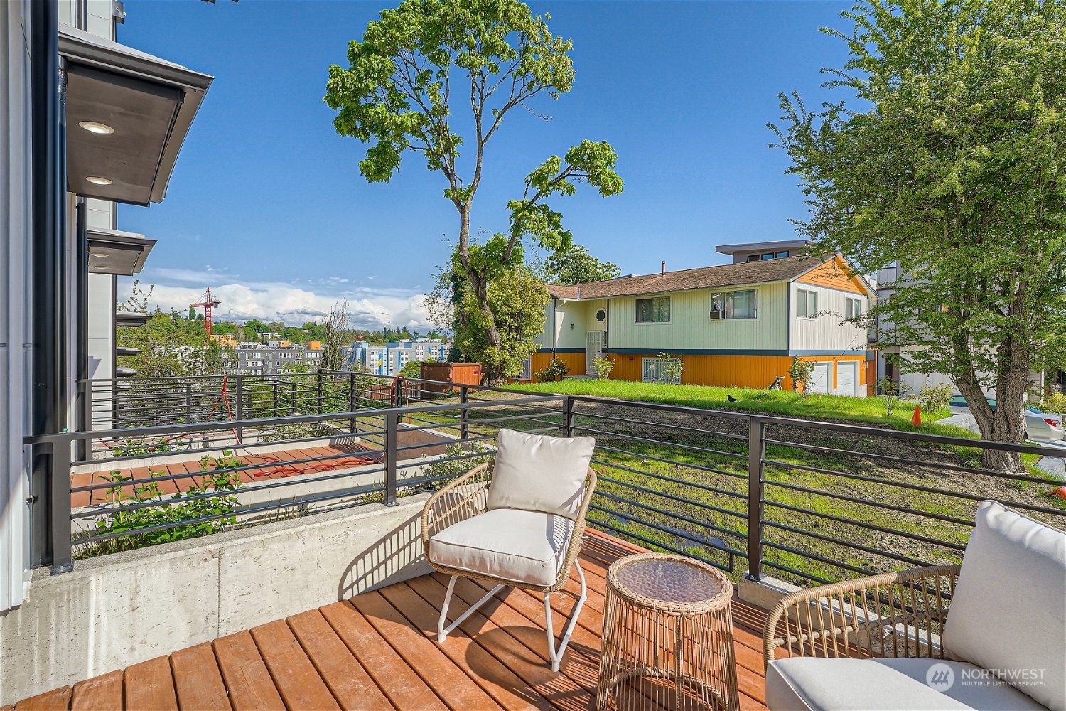 1916 South Grand Street Seattle, WA 98144 - Photo 20 of 26 a balcony with table and chairs