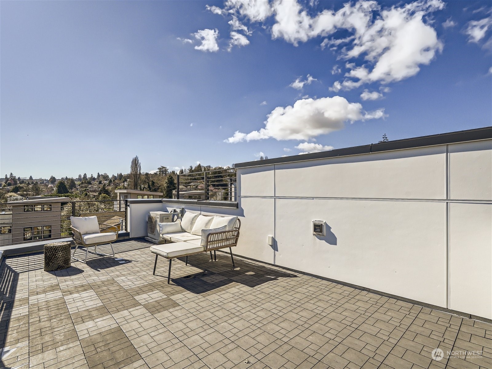 1916 South Grand Street Seattle, WA 98144 - Photo 25 of 26 a roof deck with table and chairs and potted plants