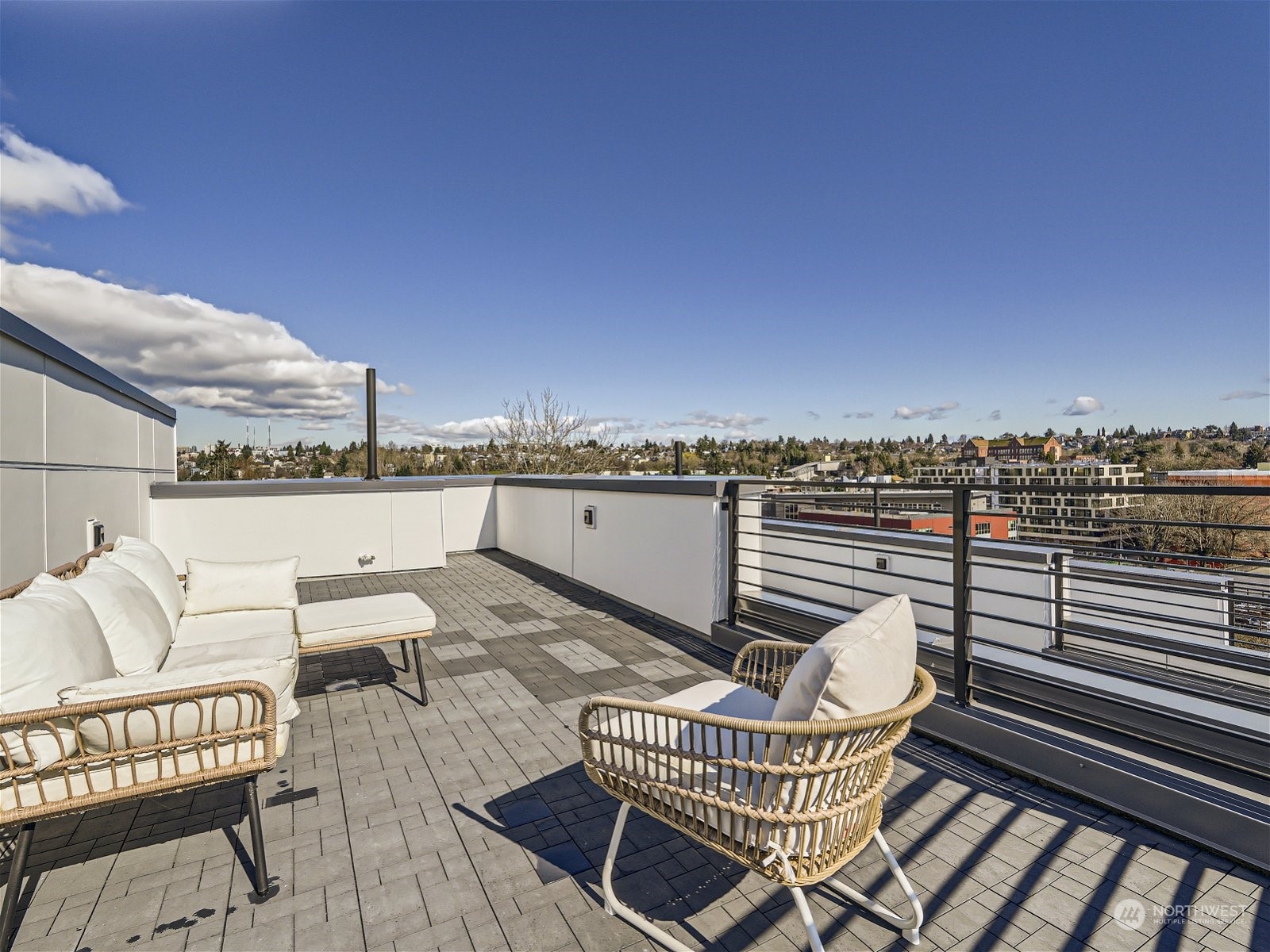 1916 South Grand Street Seattle, WA 98144 - Photo 26 of 26 a balcony with a dinning table and chairs