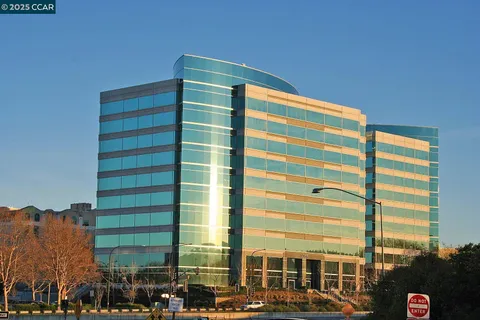 a front view of a building with a street