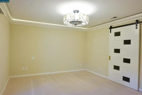 a view of a refrigerator in a kitchen