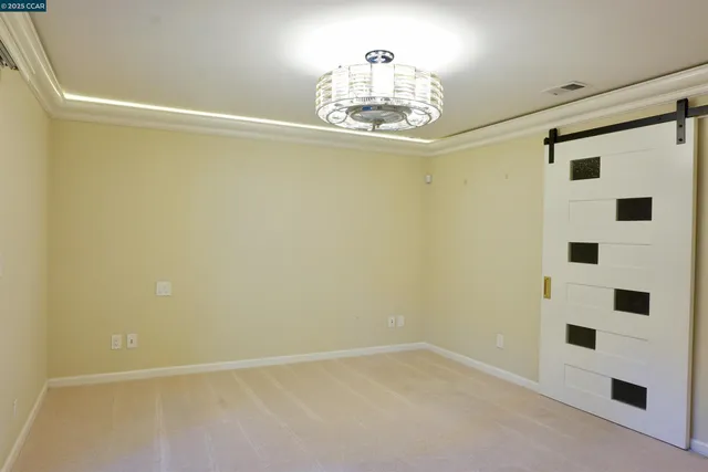 a view of a refrigerator in a kitchen