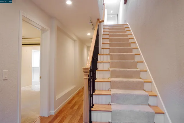 a view of entryway with wooden floor