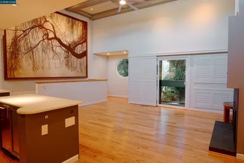 a bathroom with a sink a mirror and a shower