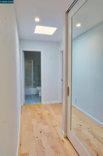 wooden floor in a hall with an entryway