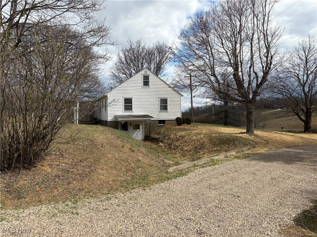 9801 Clay Pike Road Byesville, OH 43723 - Photo 2 of 27 View of side of home