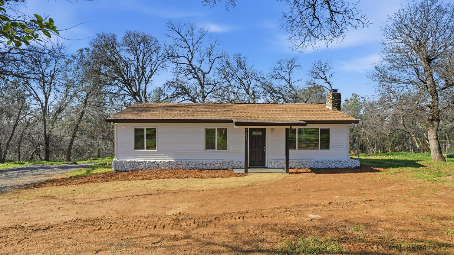 6741 Big Sandy Lane Placerville, CA 95667 - Photo 23 of 25 a front view of house with yard and trees