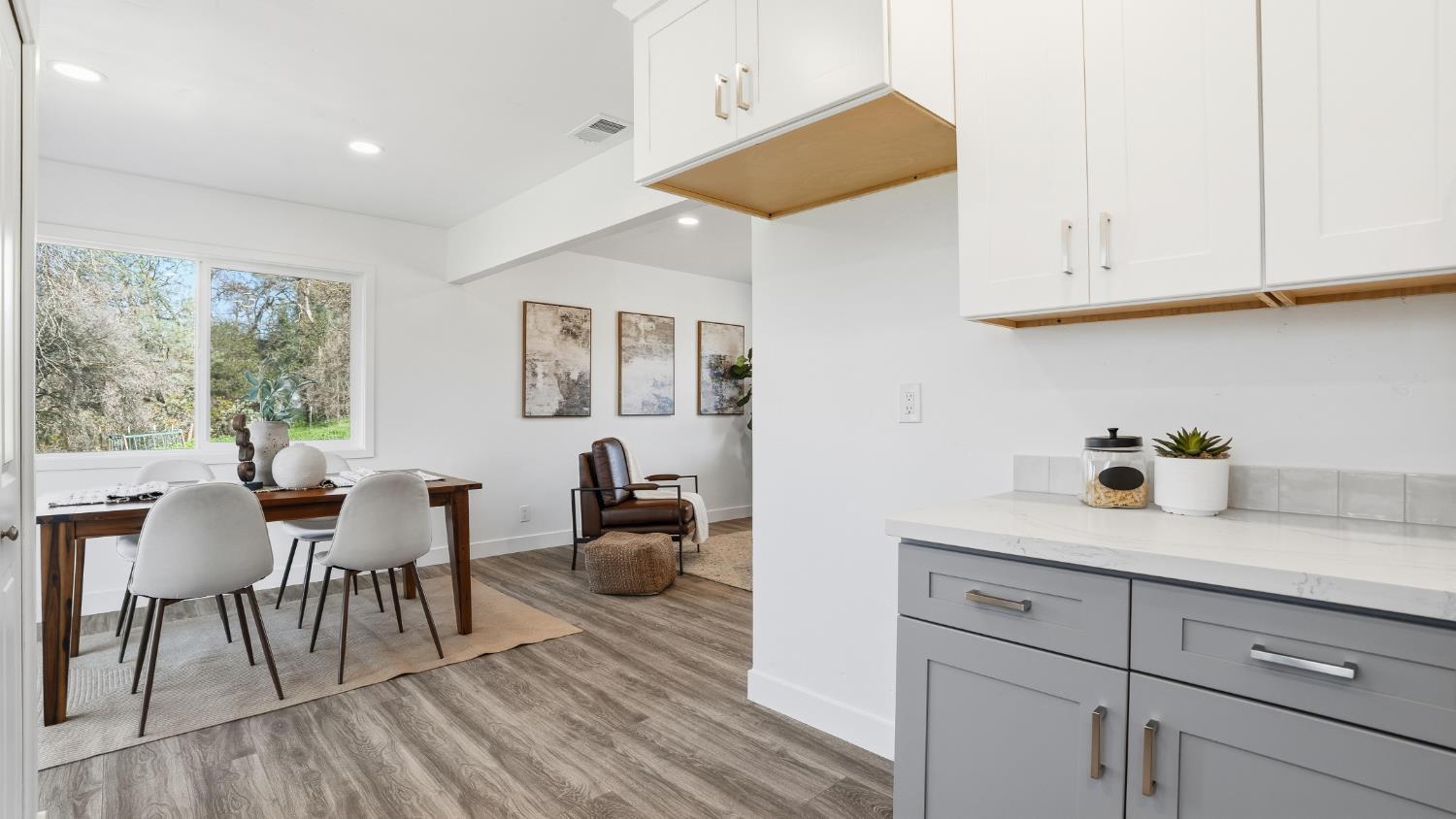 6741 Big Sandy Lane Placerville, CA 95667 - Photo 4 of 25 a kitchen with sink cabinets and dining table