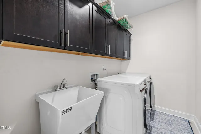 a view of a lake with a house in the background