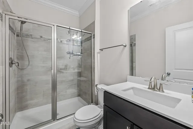a view of a a dining room with furniture window and wooden floor