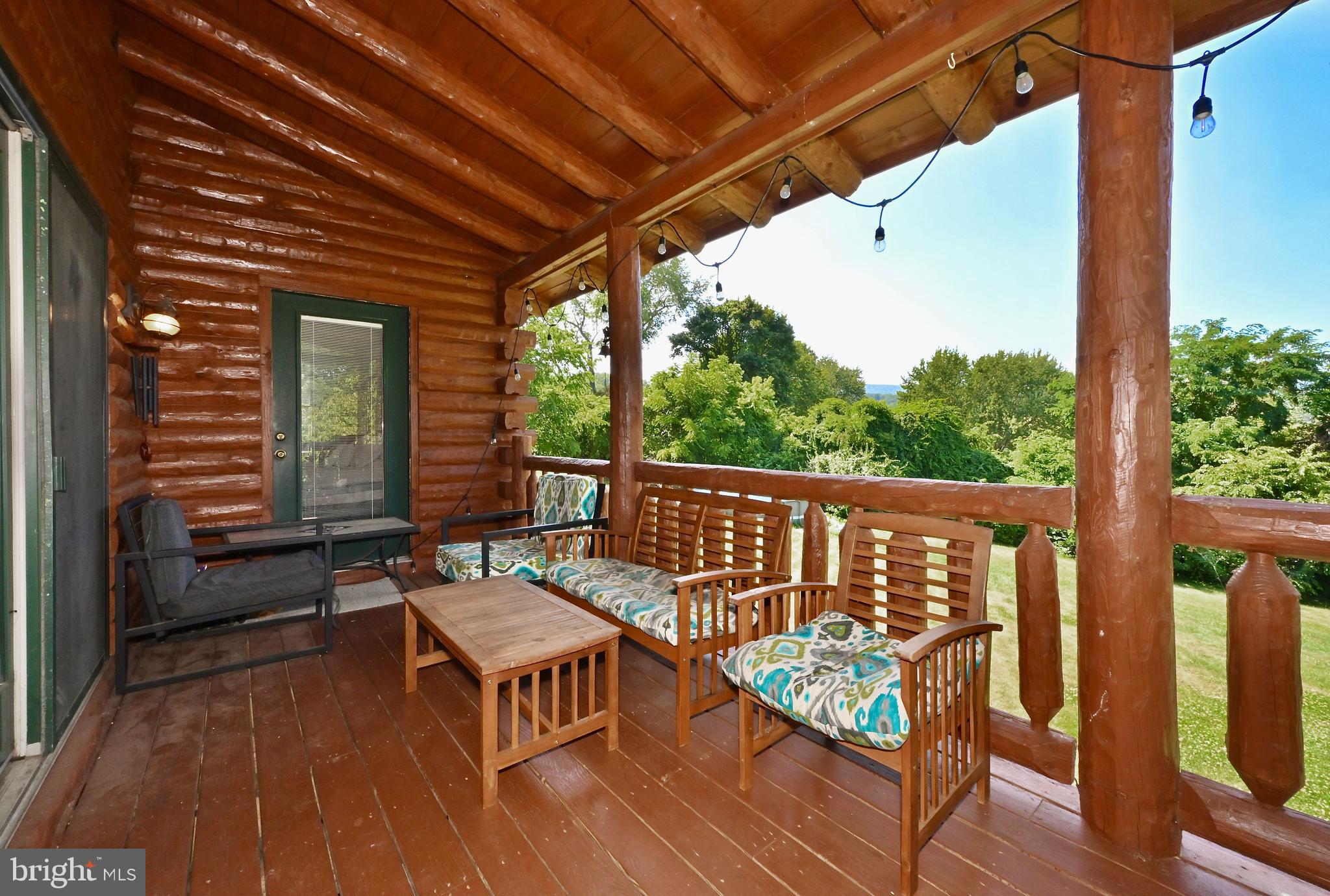 8051 Old Receiver Road Frederick, MD 21702 - Photo 25 of 54 Spacious back porch overlooking natural settings