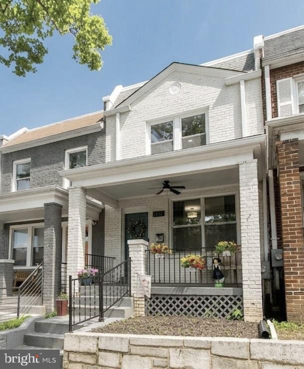 1702 Lang Place Northeast Washington, DC 20002 - Photo 1 of 29 Charming brick facade with inviting porch.