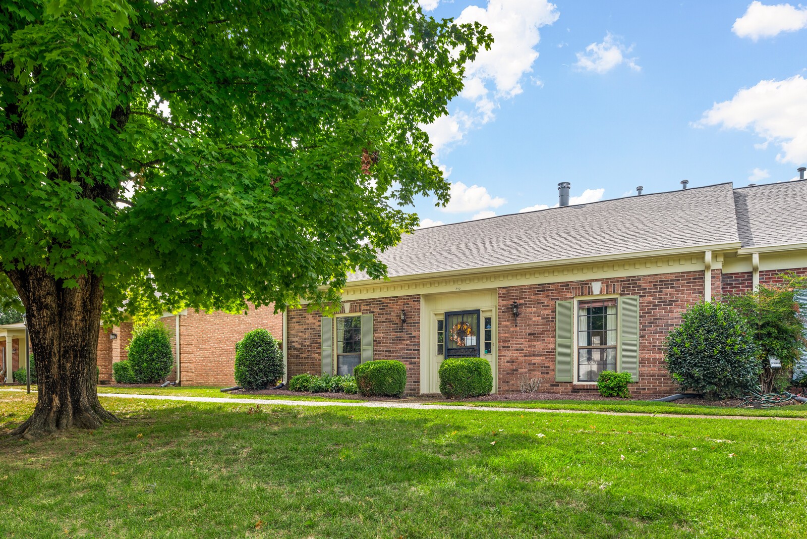 710 General George Patton Road Nashville, TN 37221 - Photo 1 of 18 a front view of a house with a yard