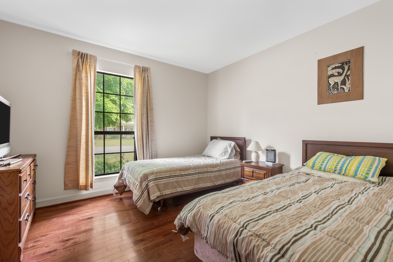 710 General George Patton Road Nashville, TN 37221 - Photo 13 of 18 a bedroom with two beds and a window