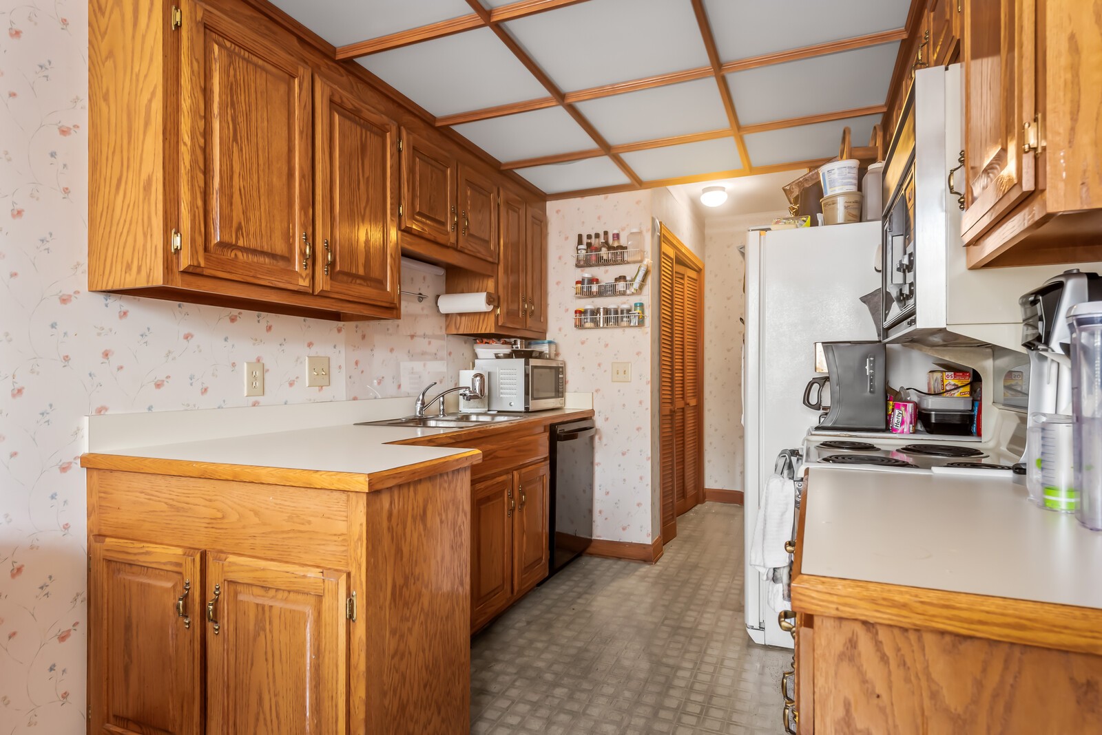 710 General George Patton Road Nashville, TN 37221 - Photo 16 of 18 a kitchen with stainless steel appliances granite countertop a sink stove and refrigerator