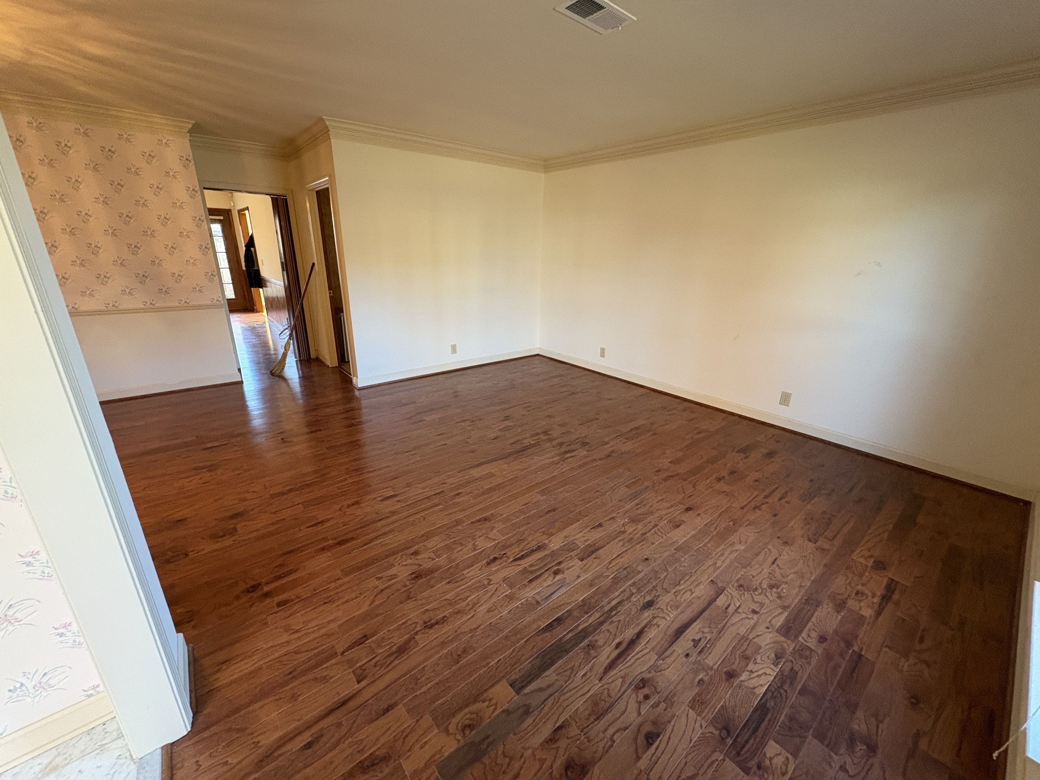 710 General George Patton Road Nashville, TN 37221 - Photo 8 of 18 a view of empty room with wooden floor and stairs