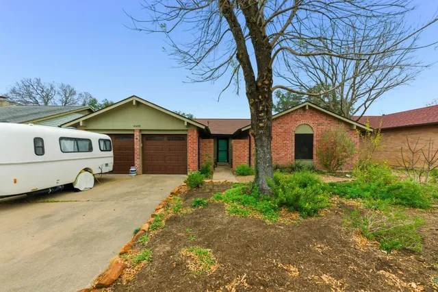 a house view with a outdoor space