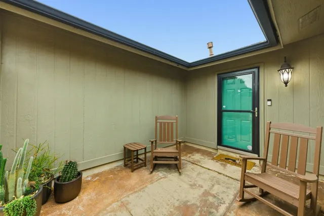 a living room with a furniture