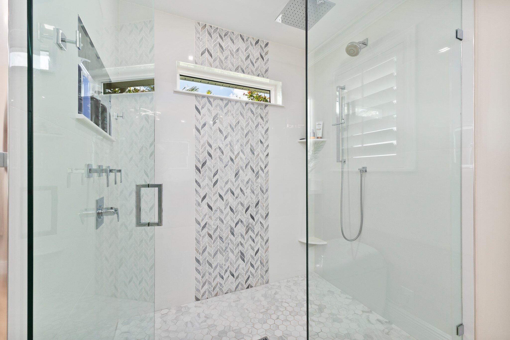 3142 Southeast Fairway West Stuart, FL 34997 - Photo 19 of 38 a bathroom with a shower