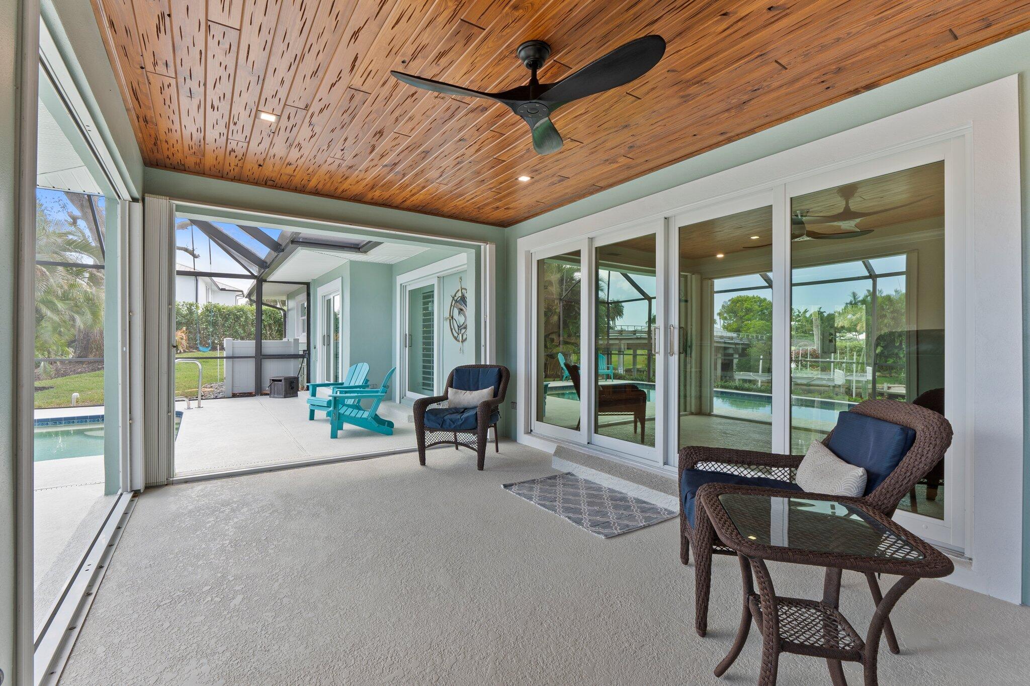 3142 Southeast Fairway West Stuart, FL 34997 - Photo 28 of 38 a living room with furniture and a large window