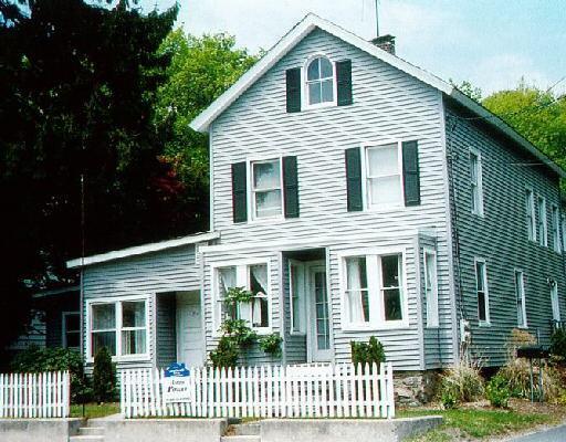 21 Ward Street, Unit A Norwalk, CT 06851 - Photo 1 of 1 a front view of a house with a porch